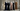 Four trend-setting 2026 abayas on mannequins in a modern gallery — blue velvet, blush chiffon, tonal black, camel crepe
