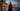 Woman in a midnight navy embellished abaya along Dubai Marina with the Burj Khalifa at dusk